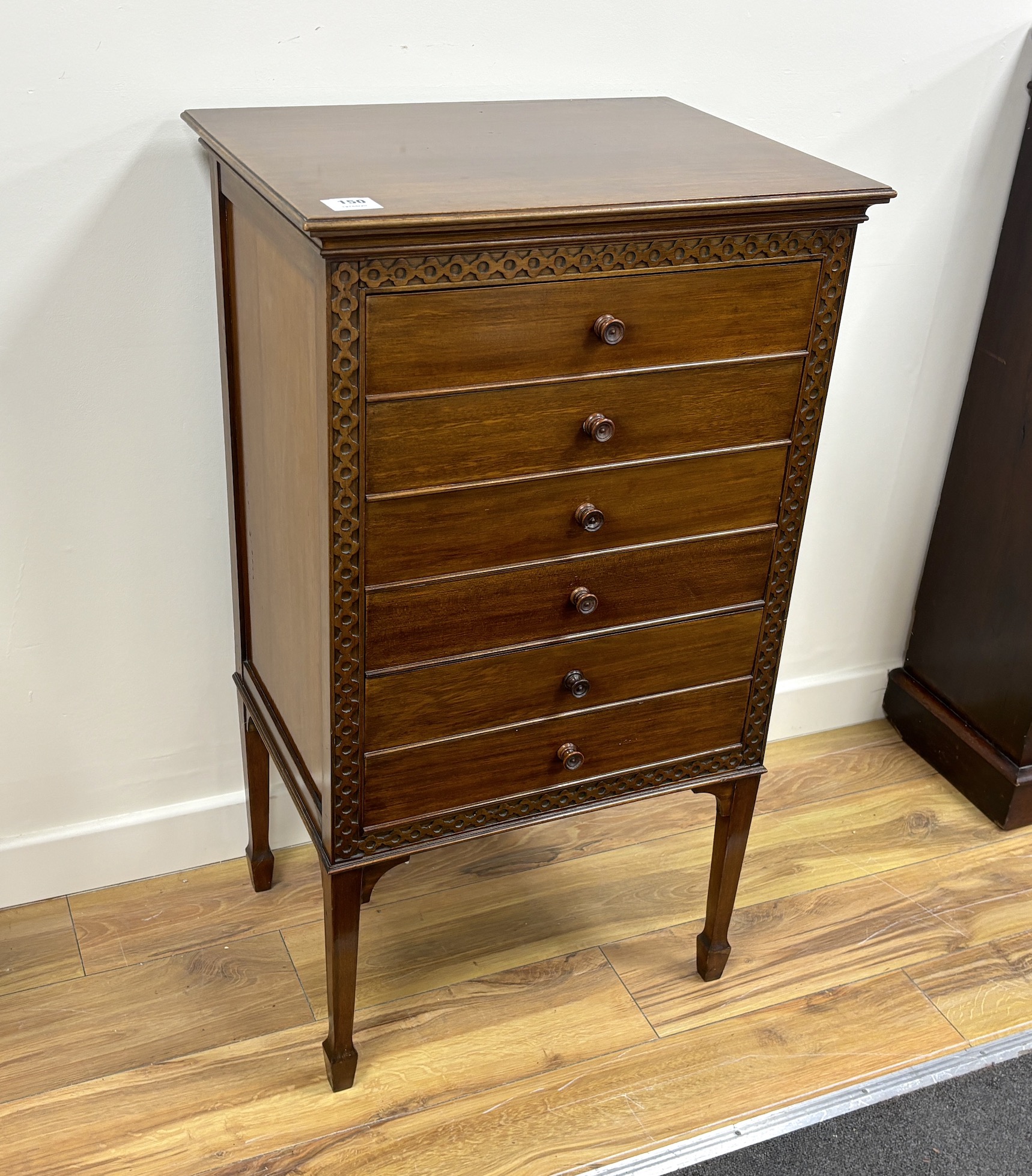 An Edwardian mahogany music cabinet, width 54cm, depth 41cm, height 95cm